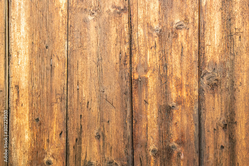 Background of wooden planks of brown color