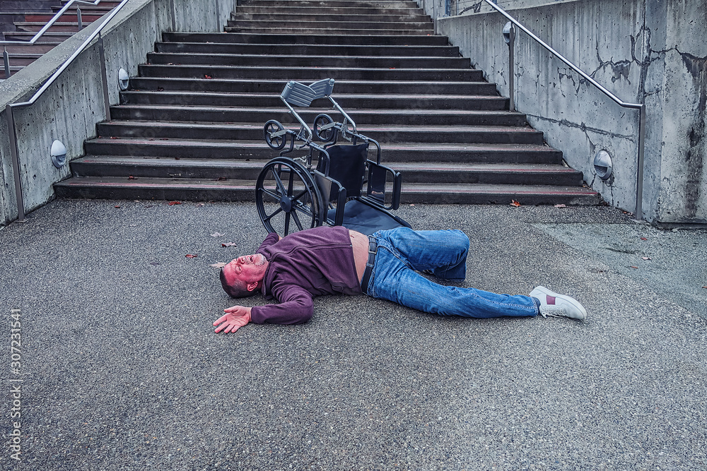 Disabled man falling off of wheelchair in accident Stock Photo Adobe