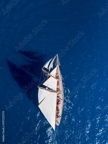Vertical overhead shot of a schooner sailing in the sea