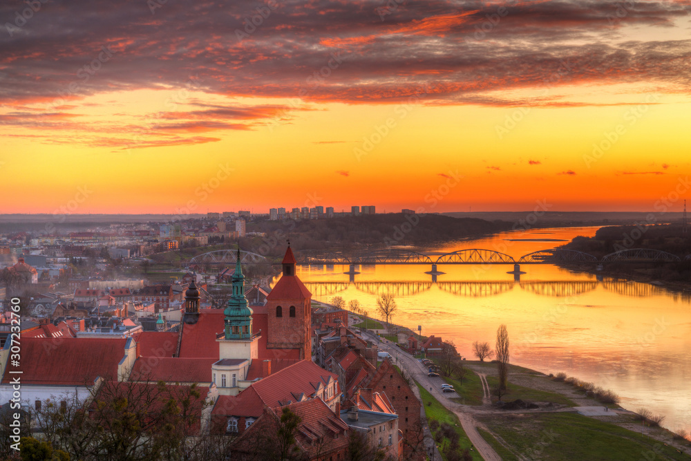 Old town of Grudziadz and the Vistula River at sunset. Kuyavian-Pomeranian Voivodeship, Poland.