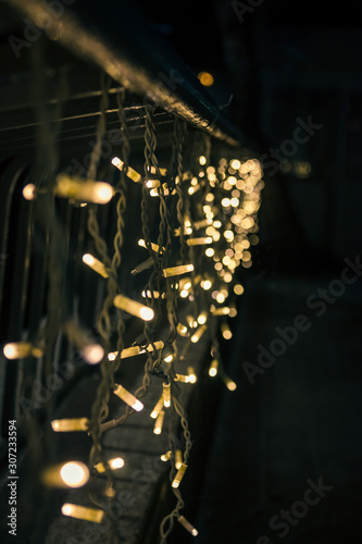 Christmas garland in the night city as a decoration of the city