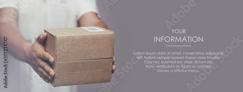 Deliveryman hold parcel box. Freight transportation. Express delivery. Web article template. Long header banner format. Sale coupon. Visit card. Your information. Text space.