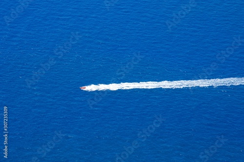 wake of motorboat on the ocean © tatiana