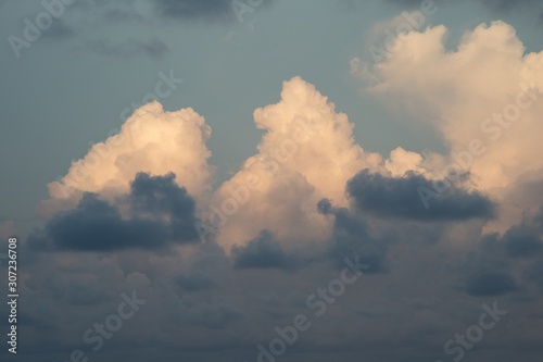 Puffy Cloud Mountains at Sunset