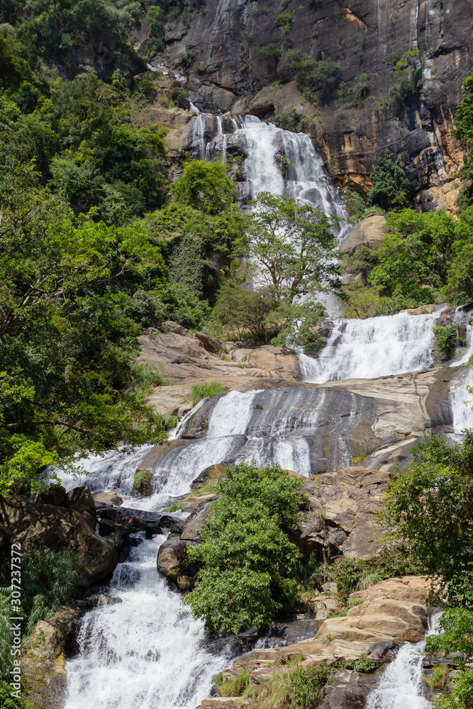 Beautiful view of the mountains and the waterfall Beautiful view of the mountains and the waterfall