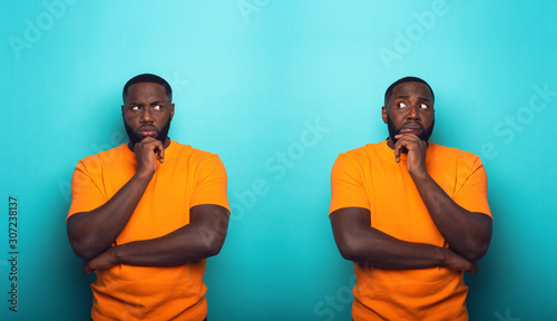 Black man with feelings of guilt is in doubt whit himself photo