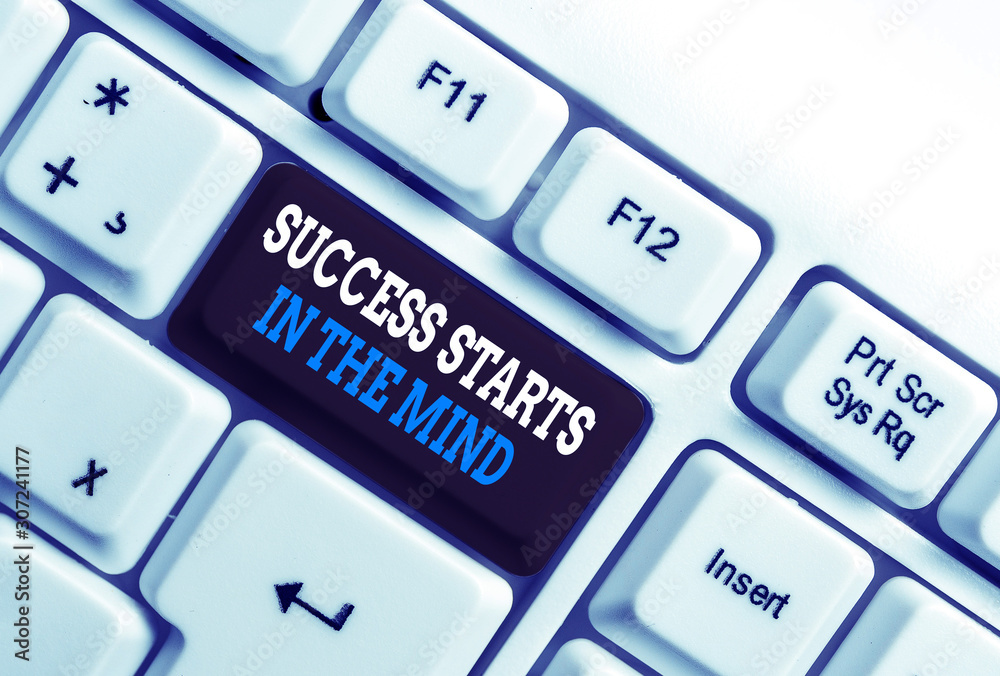 Writing note showing Success Starts In The Mind. Business concept for Have positive thoughts accomplish what you want White pc keyboard with note paper above the white background Writing note showing Success Starts In The Mind. Business concept for Have positive thoughts accomplish what you want White pc keyboard with note paper above the white background