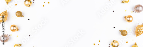 Festive white background with gold Christmas decorations. Flat lay, top view. Copy space for text.