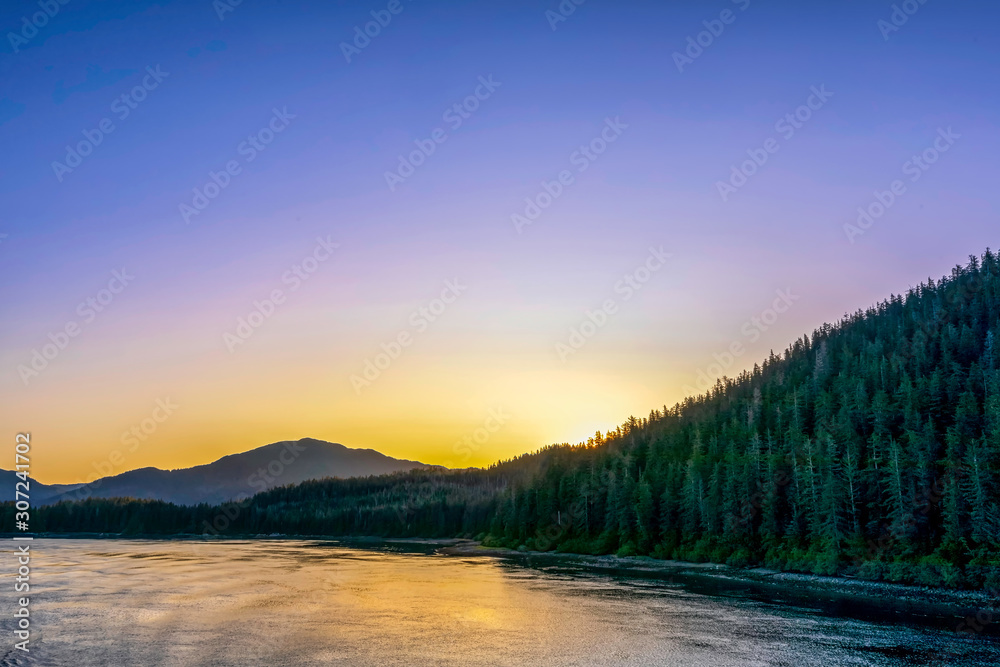 Sunrise over Mountains and Ocean Coastline