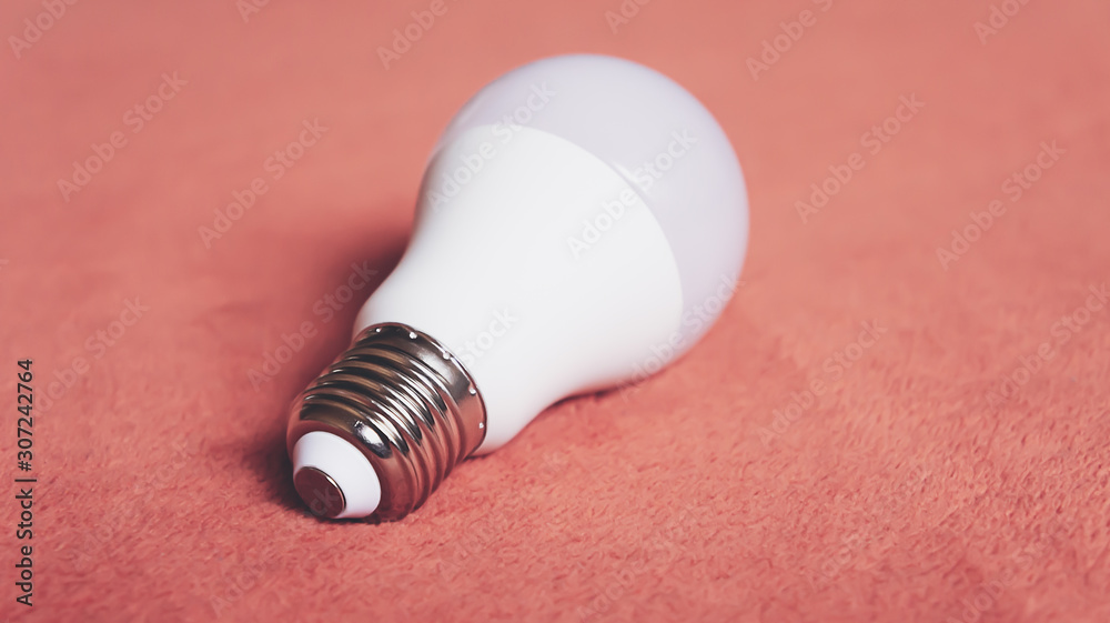 Light bulbs on a soft fluffy peach-colored background Light bulbs on a soft fluffy peach-colored background