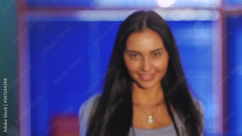 Beautiful brunette with red ball enjoys scored a strike. dynamic change of focus Beautiful brunette with red ball enjoys scored a strike. dynamic change of focus