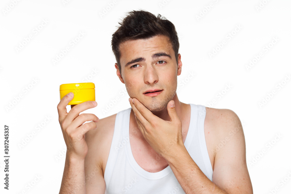 young man with glass of orange juice