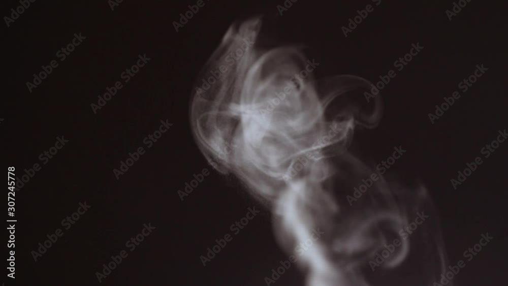 Video of white steam rising from an air cleaner or smoke from a candle. Christmas or winter concept Video of white steam rising from an air cleaner or smoke from a candle. Christmas or winter concept