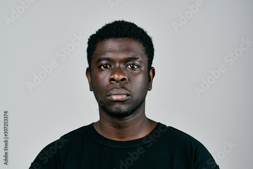 portrait of a man isolated on black background