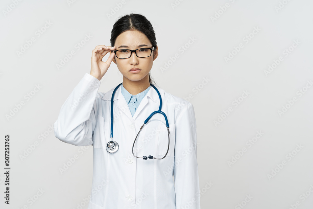 young doctor with stethoscope young doctor with stethoscope