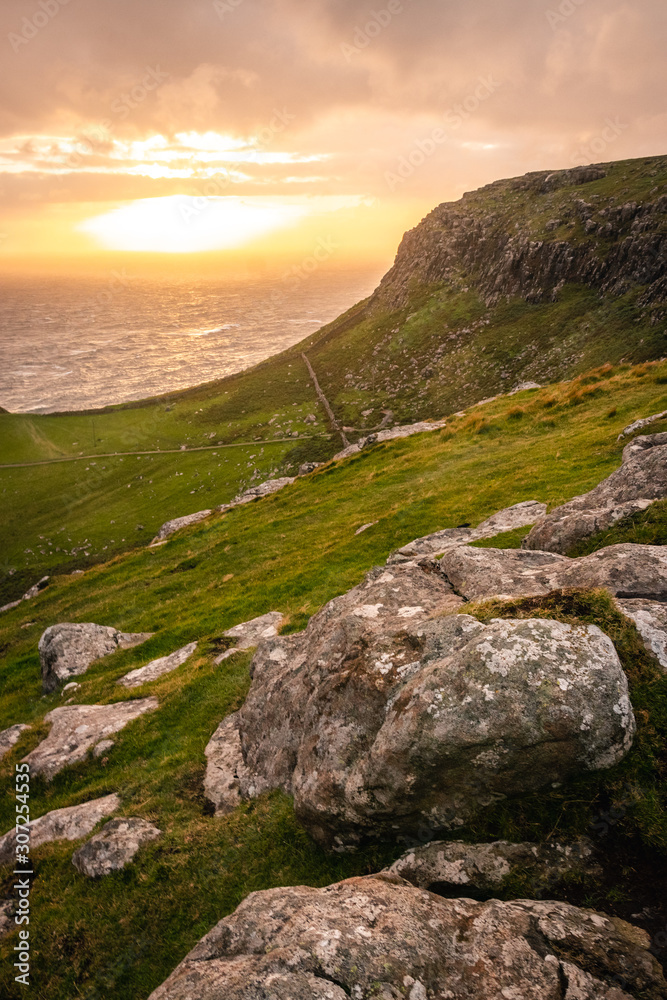 Sunset view on the curvy nature near nest point lighthouse on isle of Skye in Scotland