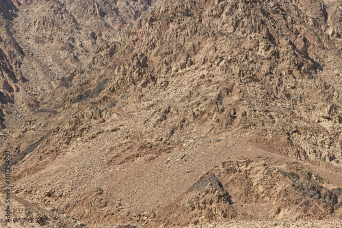 Natural texture of red rocks. Egypt, the Sinai Peninsula.