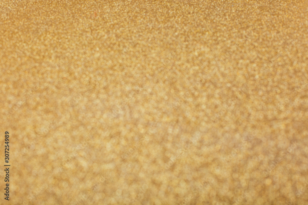Abstract blurred gold sparkle bakground. Abstract blurred gold sparkle bakground.