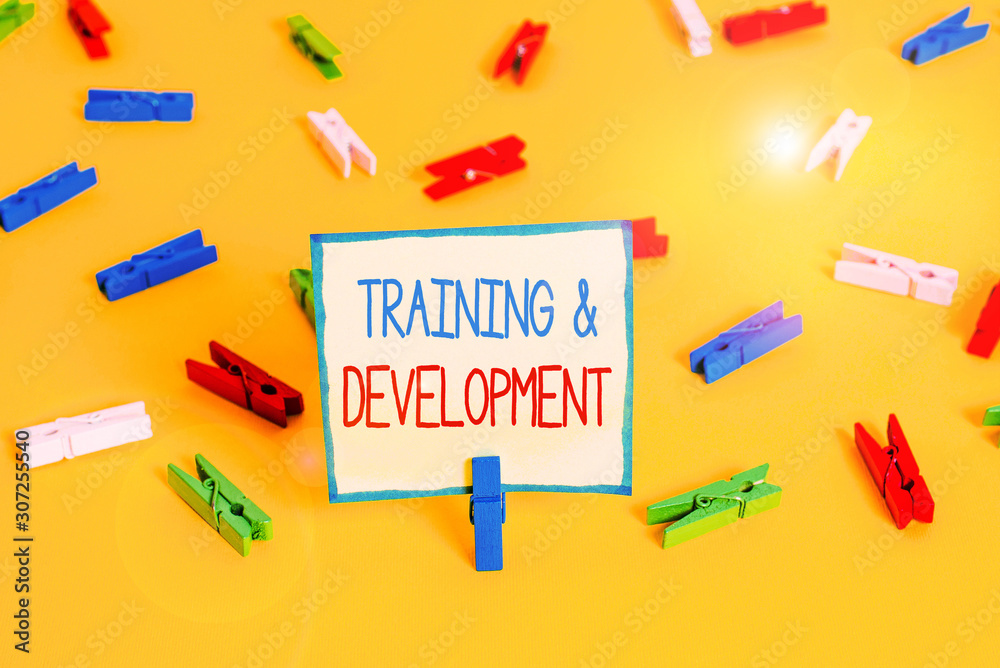 Text sign showing Training And Development. Business photo text learn specific knowledge to improve perforanalysisce Colored clothespin papers empty reminder yellow floor background office Text sign showing Training And Development. Business photo text learn specific knowledge to improve perforanalysisce Colored clothespin papers empty reminder yellow floor background office