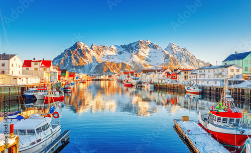 Fotografia, Obraz Beautiful Winter nature scene of fishing town on Lofoten Islands in Norway