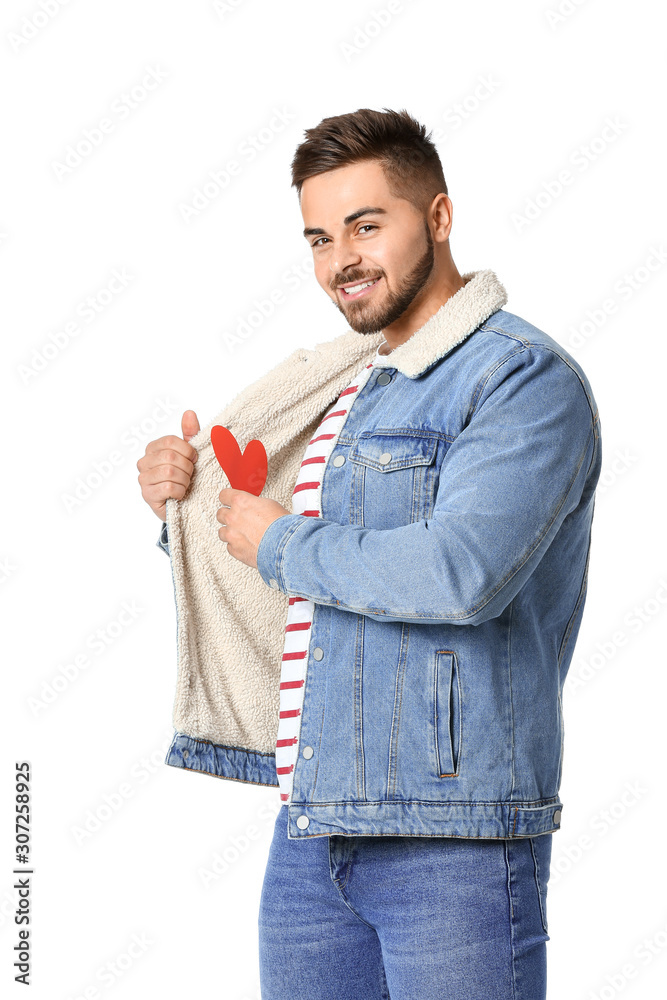 Handsome man with red heart on white background. Valentine's Day celebration Handsome man with red heart on white background. Valentine's Day celebration