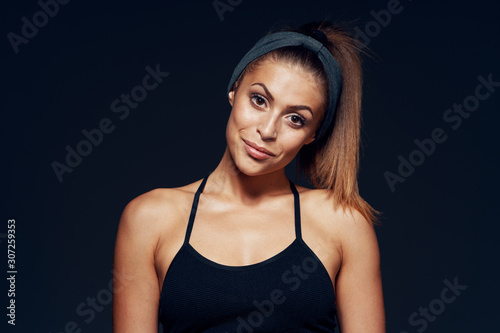 Athletic woman exercises