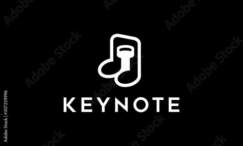 negative space logo combination fro key with note music logo design concept