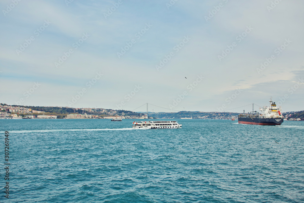 View to Istanbul and passenger ferry. River of the Bosphorus.