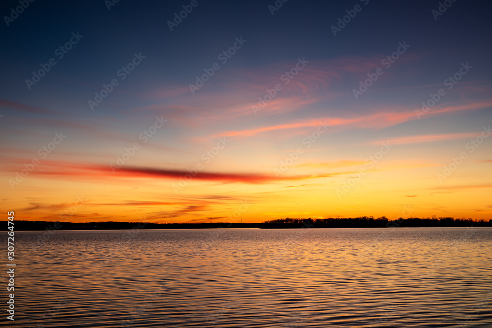 Fototapeta premium Beautiful sunset over a lake in Oklahoma.