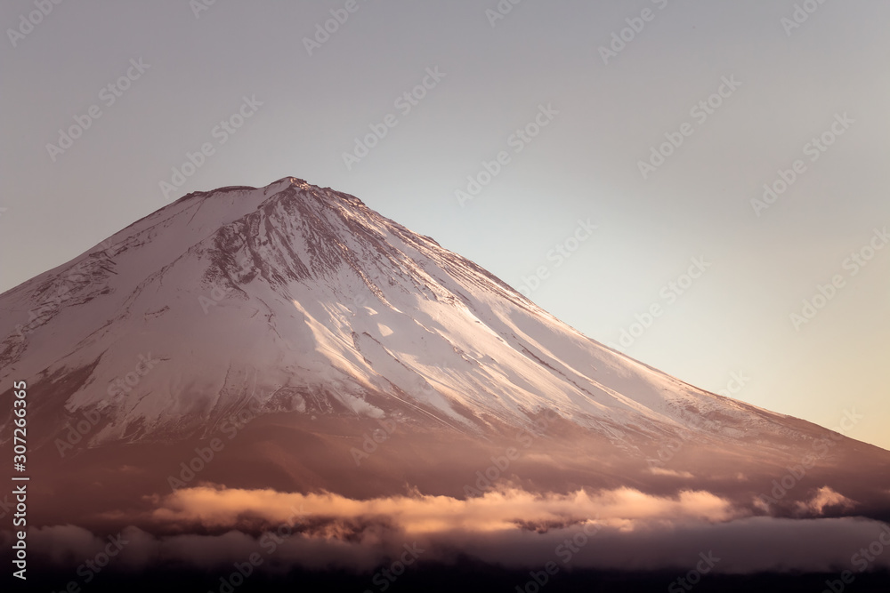Close up of Mouth crater of Fuji san with cloud and sunset light in Evening Winter season of Japan.