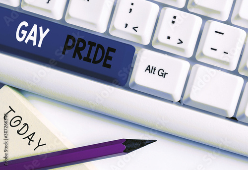 Writing note showing Gay Pride. Business concept for Dignity of an idividual that belongs to either a analysis or woanalysis White pc keyboard with note paper above the white background photo