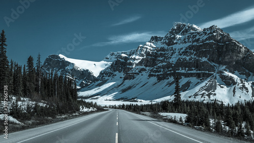 Icefields Parkway - Canada Route 93. Road in Canadian Rockies in Spring, Alberta, Canada. Cold tone.