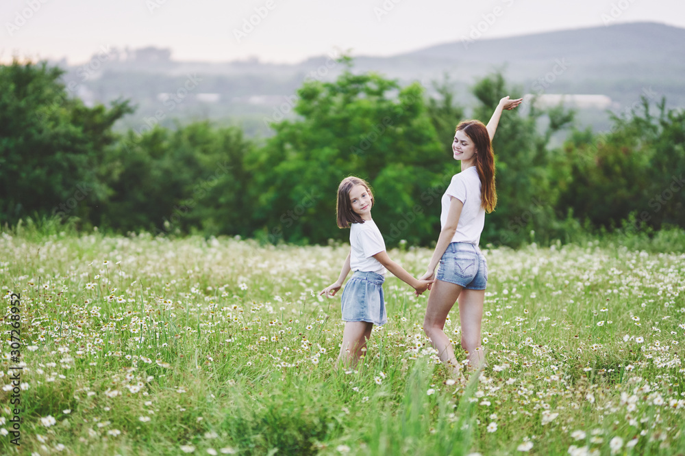 mother and daughter in the field