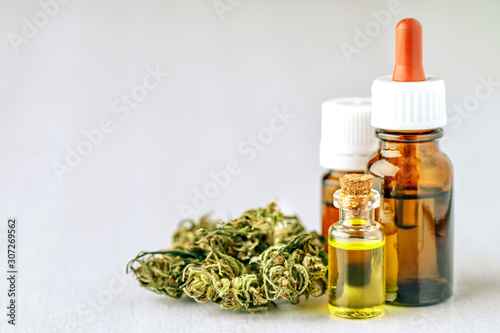 Medical Cannabis ( Marijuana ) oil ready for consumption,cannabis,Essential oil made from medicinal cannabis.Cannabis herb and leaves for treatment.Buds. Skunk. cbd