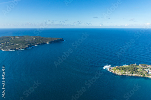 Aerial view of open ocean with North head and Vacluse suburbs of Sydney