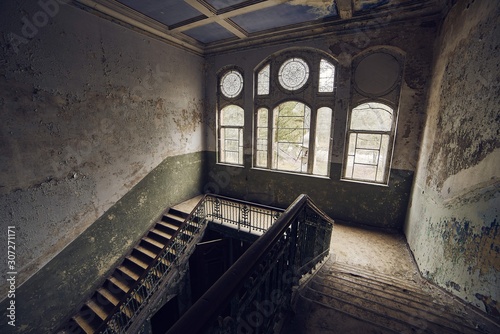 Beautiful view of the stairway in an old abandoned building