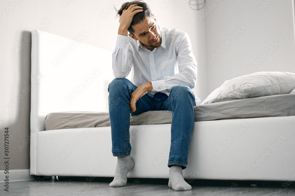man sitting on sofa and watching tv man sitting on sofa and watching tv