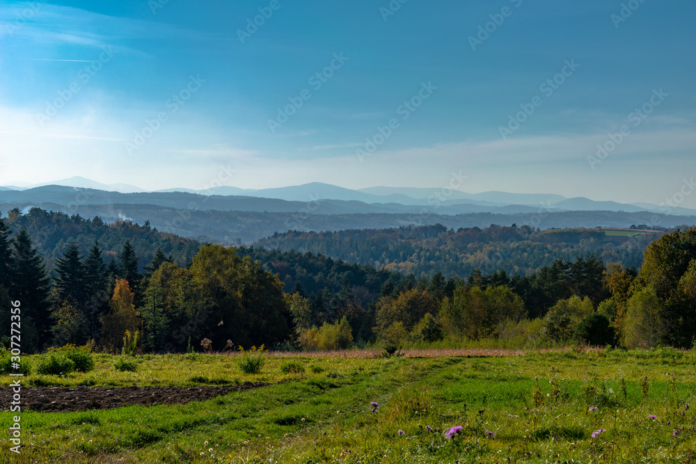 Landscape of mountains cover with fog at autumn