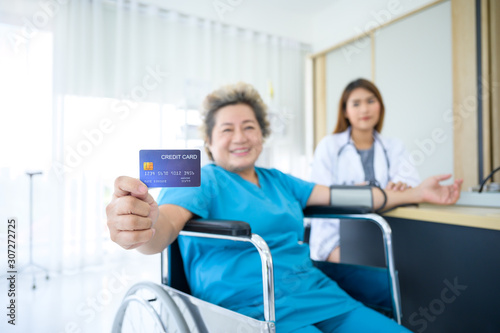 Patients show credit card for medical treatment.