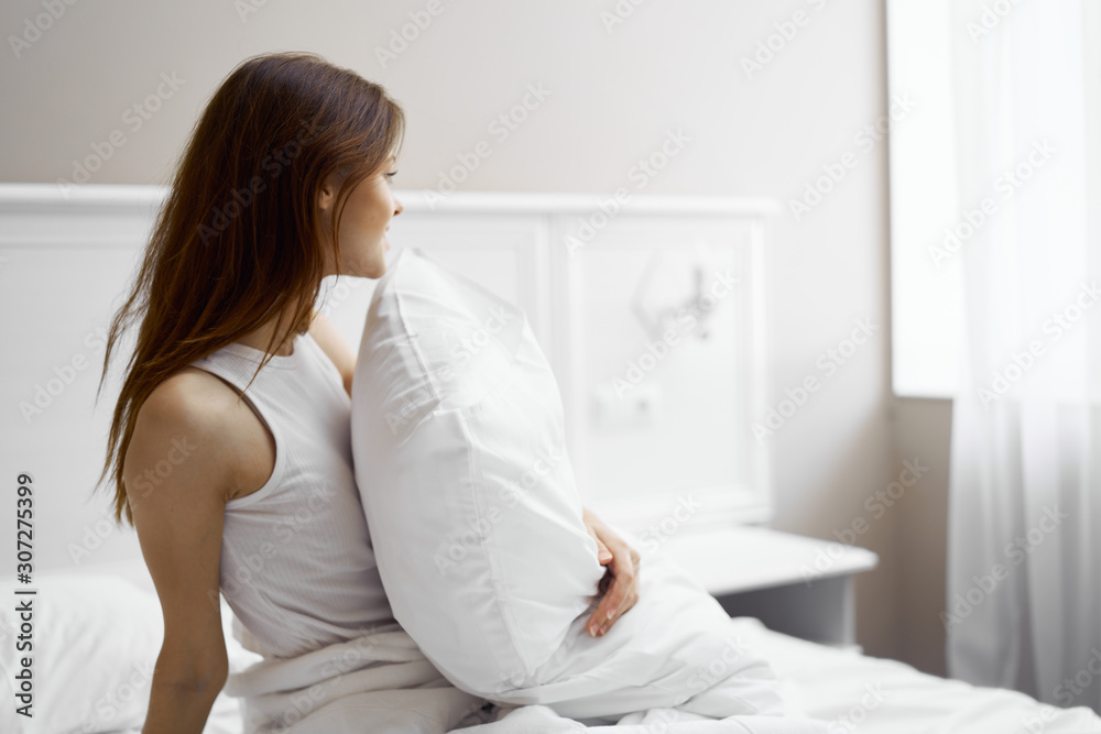 young woman sitting on sofa young woman sitting on sofa