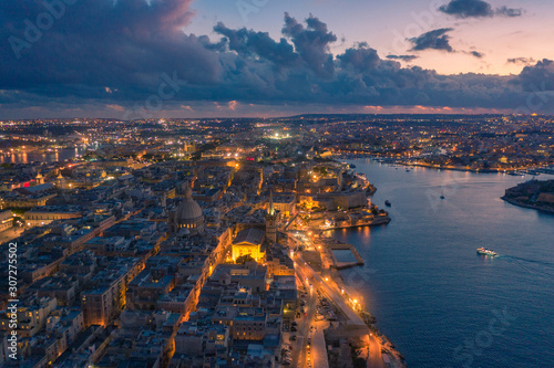Aerial view of Valletta, Malta with Basilica of Our Lady of Mount Carmel at sunset © Golden eagle