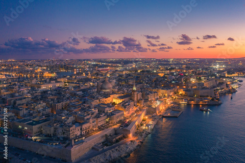 Aerial view of Valletta, Malta with Basilica of Our Lady of Mount Carmel at sunset