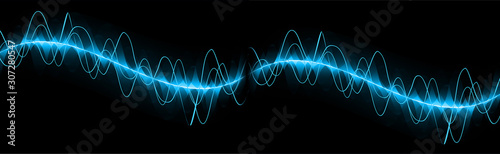 Sound waves oscillating dark blue light photo