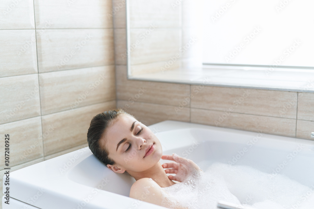 woman taking a bath woman taking a bath