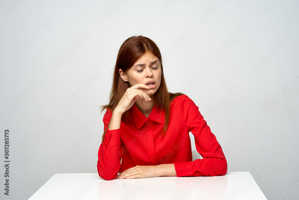 portrait of young woman sitting on the floor portrait of young woman sitting on the floor