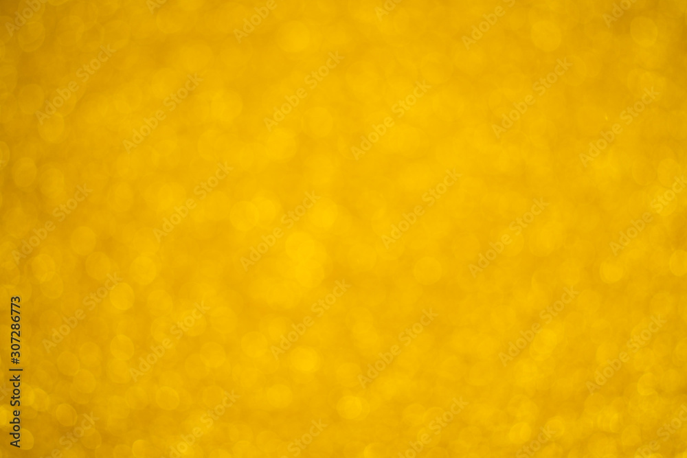 Abstract christmas blur gold glitter bokeh background