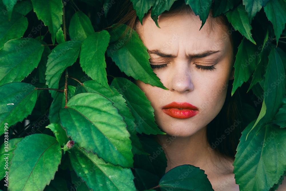 woman on nature green leaves exotic woman on nature green leaves exotic