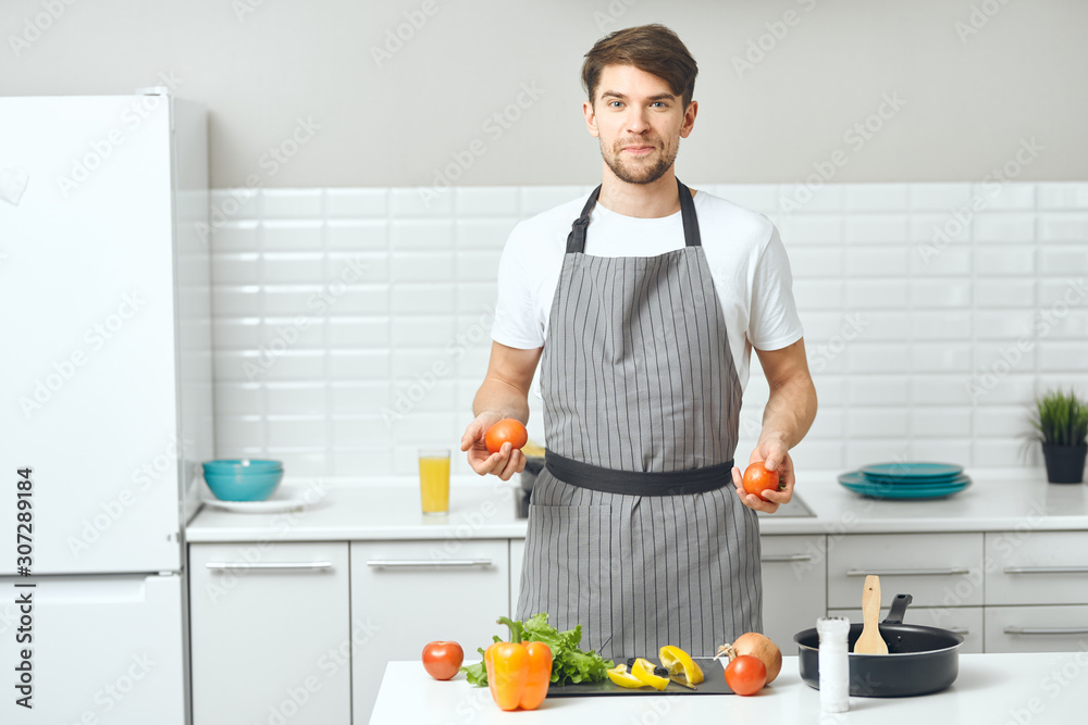 man cooking in the kitchen man cooking in the kitchen