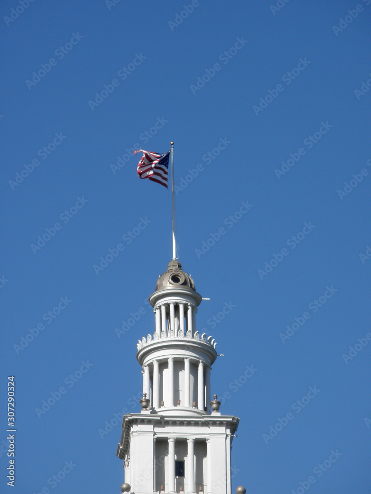 Ferry Building Clock Tower with flag waving on top