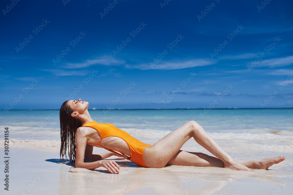 woman in bikini on beach woman in bikini on beach